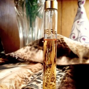 Preowned LIBRE by YSL. 65% full. .32 fl oz, eau de parfum spray. From France